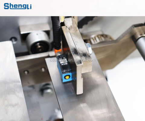Full Automatic Chocolate Ball Egg Foil Wrapping Machine for Food Processing Line